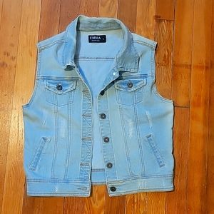 Distressed denim vest